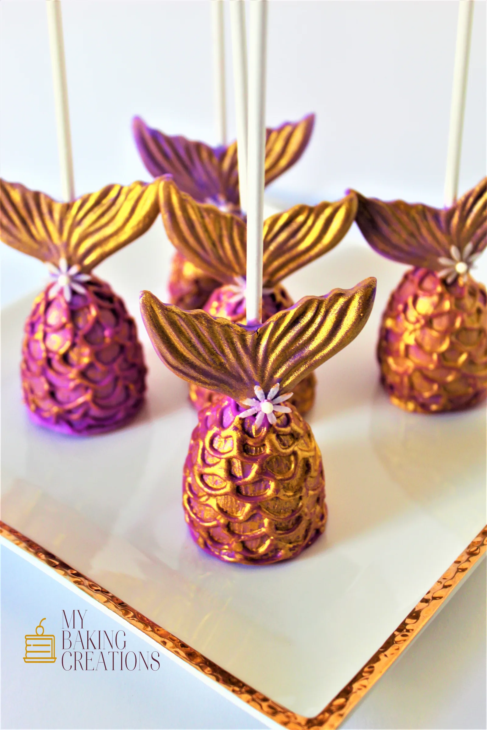 Gold and purple mermaid tail cake pops for a mermaid party in San Francisco