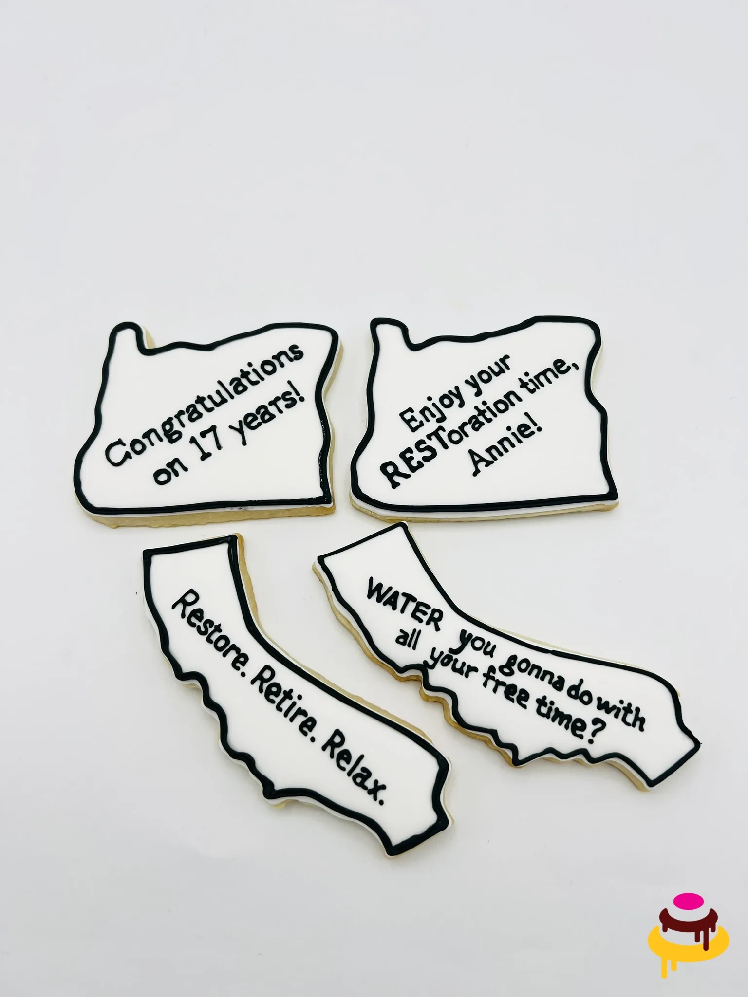 Retirement congratulations hand piped state shaped cookies in the Bay Area