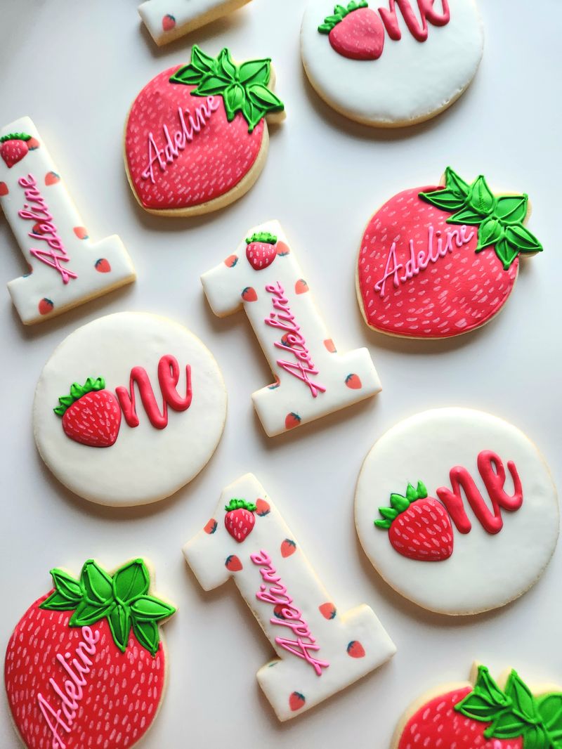 Custom strawberry themed hand piped cookies by My Baking Creations